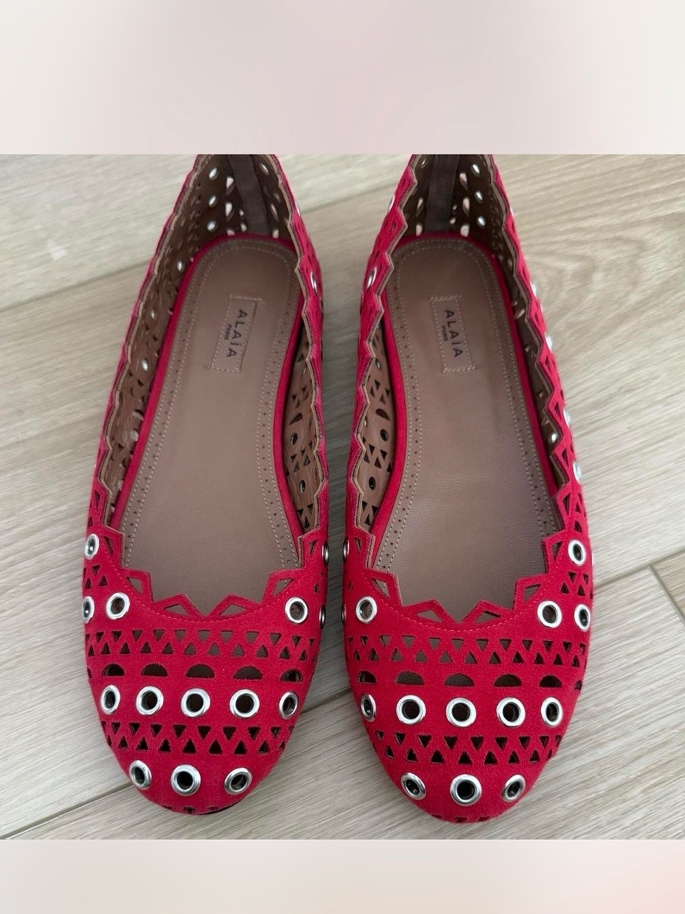 Alaïa Red Laser-Cut Grommet Flats